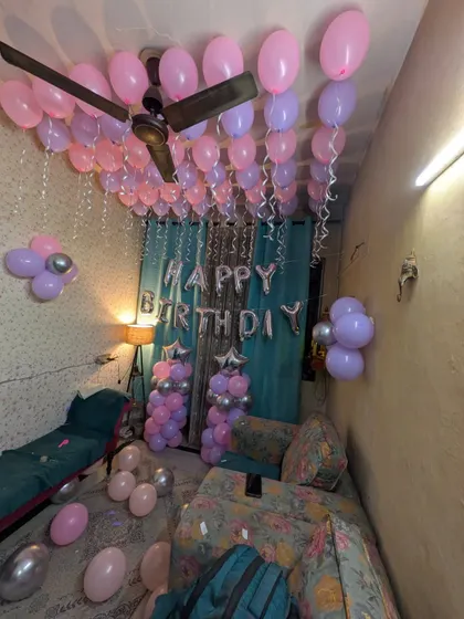 Another perspective of the pink and purple room decoration, showing how it transforms a simple bedroom.