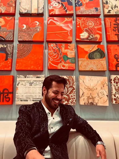 A hearty laugh captured in a candid moment, showing the fun and joy I bring to events.