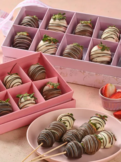 Berry sweet indulgence. These are our beautiful chocolate-dipped strawberries, available on skewers or in elegant gift boxes.