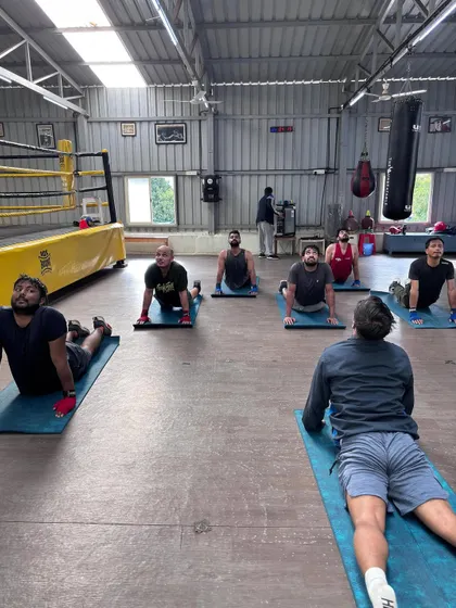 The cobra stretch is great for the core and back after a tough boxing workout. We make sure to include comprehensive stretching in our cool-downs.