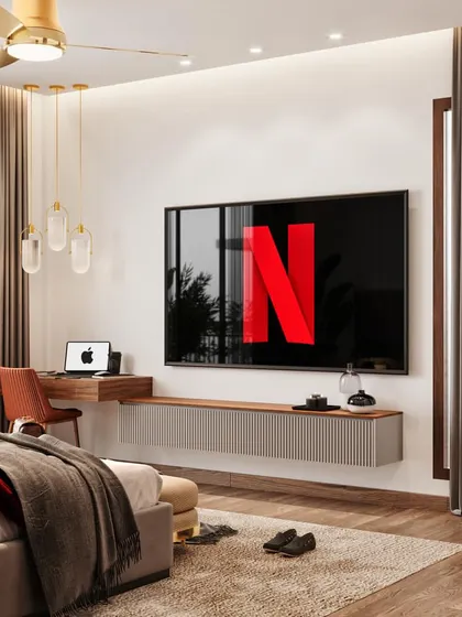 The TV and study nook area of the bedroom, featuring a floating desk and console. This CGI helps clients visualize how to integrate a workspace without compromising the room's relaxing feel.