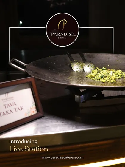 Introducing our live Tawa Taka Tak station. The sizzling sounds and aromatic spices create an exciting atmosphere as our chefs cook up this popular street food dish.