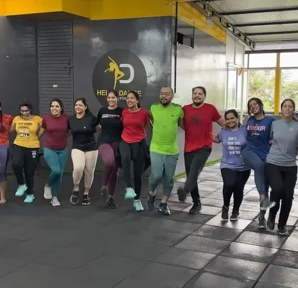 Our Zumba class practicing a coordinated dance-fitness routine. It's a fun way to improve coordination and cardiovascular health.