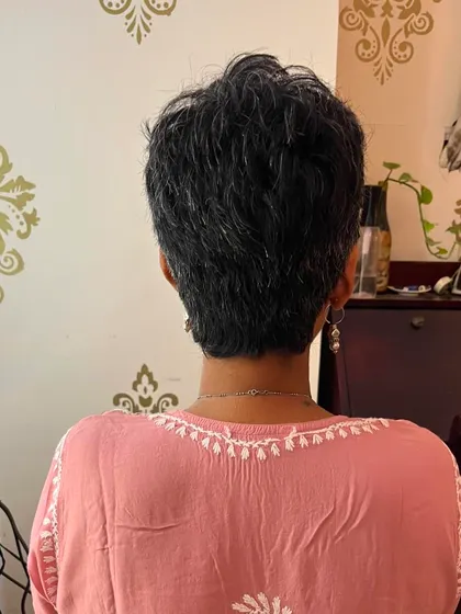 The back view, showing the clean, tapered neckline.