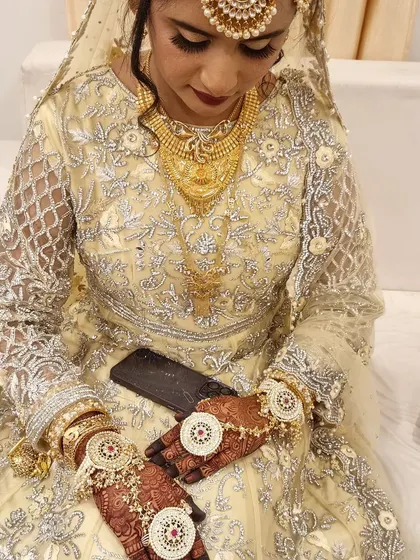 A beautiful bride surrounded by her loved ones. I also did the henna for her family and friends, ensuring everyone had beautiful hands for the photos.