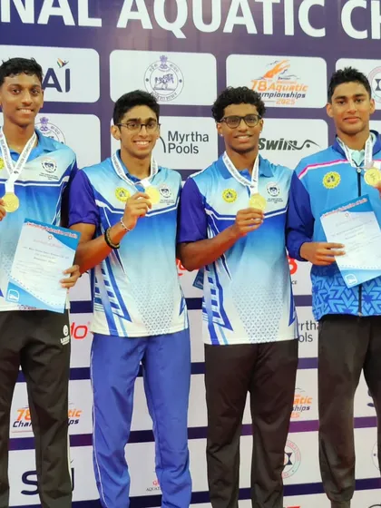 Our men's 4x200m Freestyle Relay team celebrates their gold medal win. This victory is a result of synchronized teamwork and individual excellence from our athletes Tanish, Dharshan, and Aneesh, who are key members of our elite swim squad.