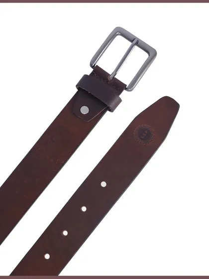 An unbuckled brown leather belt, showing the buckle and the tip of the belt.