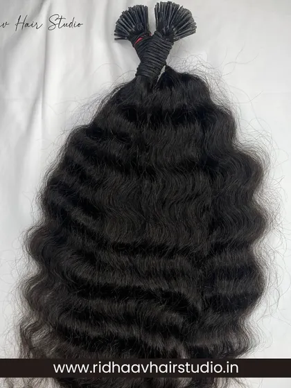 A full bundle of our I-Tip Single Drawn Raw Curly Hair Extensions. These are perfect for anyone looking to add significant volume and authentic-looking curls to their hair.