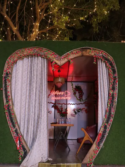Celebrating another year together. This heart-shaped entrance leads to a private dining space, specially decorated for an anniversary.
