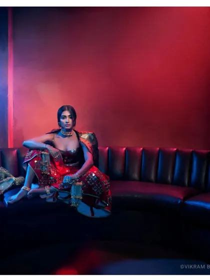 A grunge-inspired editorial look with actress Pooja Hegde for Femina Wedding Times. We used contrasting red and blue lights against a dark setting to create a modern, edgy bridal look.