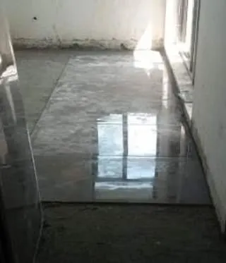 The reflection on the newly laid tiles shows the quality of the material and the precision of our installation work.