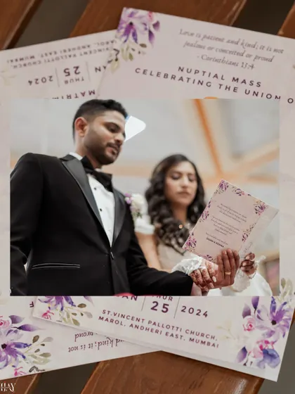 A creative shot of the couple reading their vows, framed by their beautiful wedding invitations.