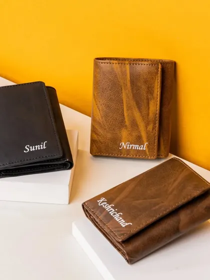 The 3-fold wallet is available in black and two shades of brown, with custom name embroidery, making it a great personalized gift for anyone.
