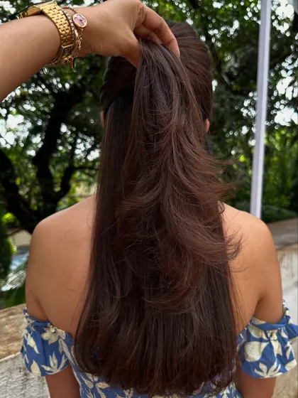 The ponytail pull, my favorite way to show off the dimension and texture of a new layered haircut.