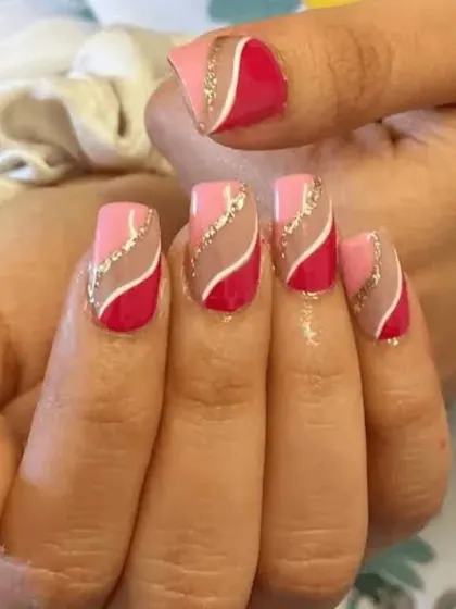 A creative and artistic design using shades of pink and red. I used negative space and wavy lines of gold glitter to create a modern and eye-catching pattern.