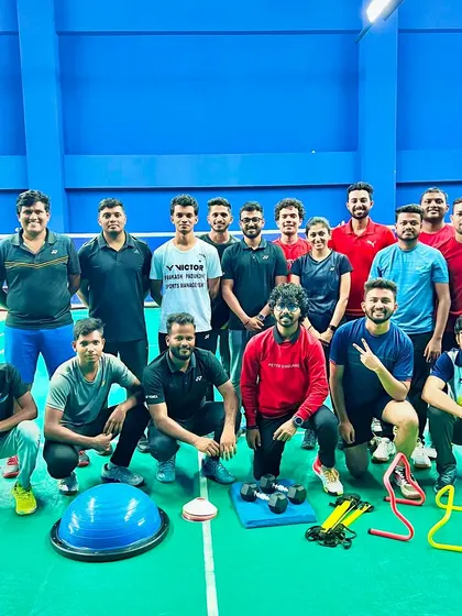 Participants of the Beginner Level CCP pose with the strength and conditioning equipment used during their training. My program provides a holistic view of athlete development, including essential fitness knowledge.
