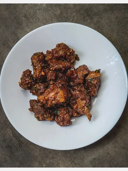 This is my take on the Chettinad classic, Uppu Kari, made with tender shoulder cuts of fatty Bannur Lamb. The meat is slow-cooked in its own fat with minimal spices, letting the quality of the lamb shine through.