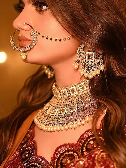 It's all in the details. This close-up on a bridal jewelry set highlights the craftsmanship of the product. I focus on capturing the sparkle and texture that make luxury accessories desirable for high-end ethnic wear campaigns.
