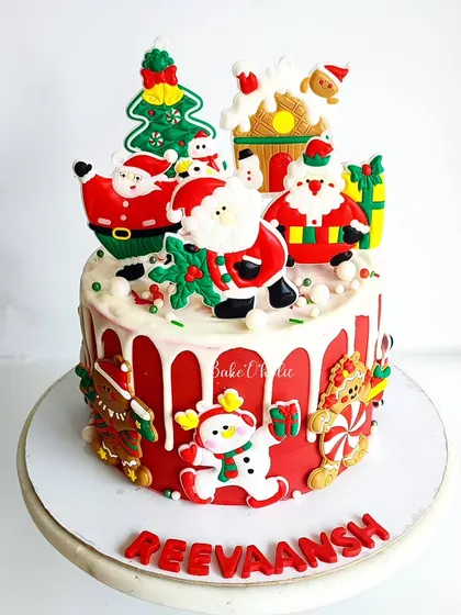 A closer look at the Christmas cheer on this birthday cake. All the little characters are handcrafted and add to the festive spirit.