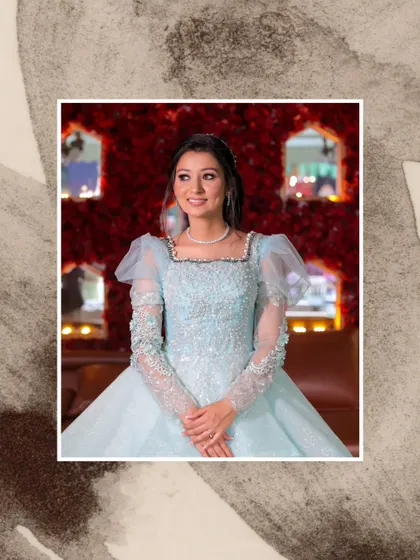 A beautiful solo portrait of the bride-to-be at her engagement. Her princess-style gown and the elegant decor create a dreamy, romantic image.