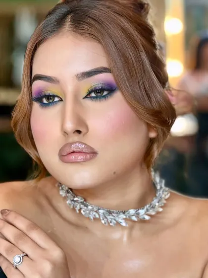 Celestial eyes. This look is a playground of colours, with yellow, purple, and blue blended together for a truly unique and artistic cocktail look.