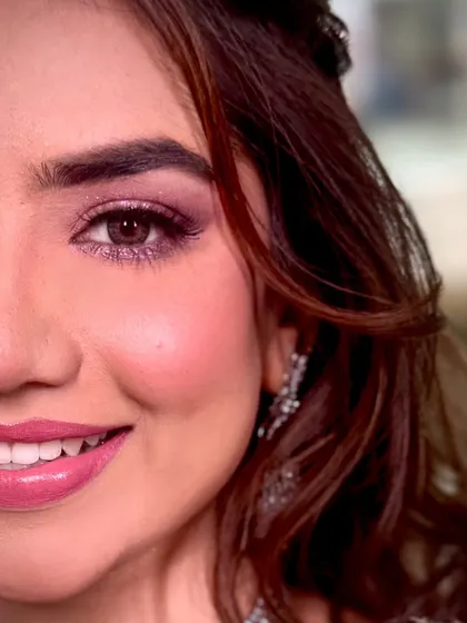 An extreme close-up of the mauve eye makeup. I used shimmering mauve and pink tones to create a look that is soft, girly, and bubbly, yet full of glam and shine.
