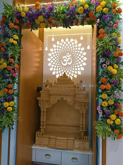 We believe your home mandir deserves special attention. Here, we framed a beautiful wooden temple with a vibrant garland of fresh marigolds and other colorful flowers, enhancing the sanctity and beauty of the sacred space.