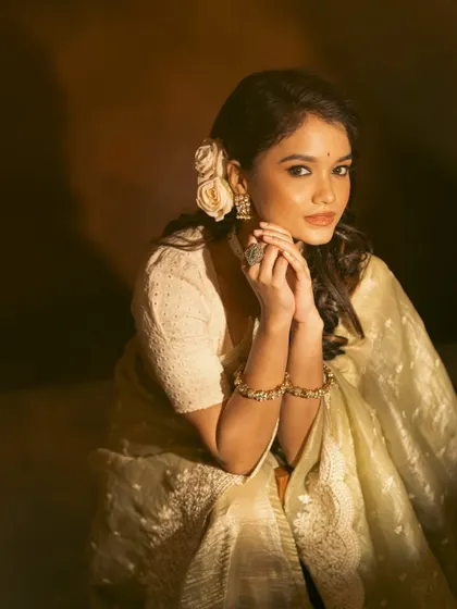 A collection of images from a retro-themed photoshoot with the beautiful actress Sanjana Tiwari. I created a soft, classic hairstyle with side-swept curls and floral accents to match the vintage aesthetic.