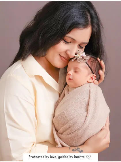 The unbreakable bond between a mother and her newborn. This quiet, gentle moment is a powerful reminder of the love and protection that surrounds your baby from their very first day.