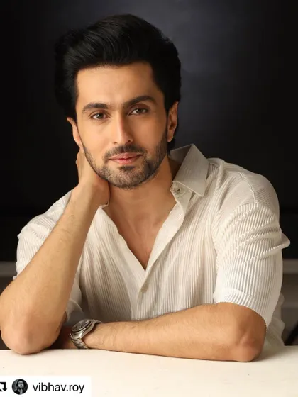 A great headshot of actor Vibhav Roy. The haircut is clean and classic, a style that is always in demand.