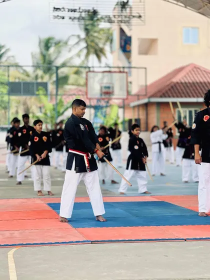 An instructor leads a group of students through drills at the National Samurai Championship.