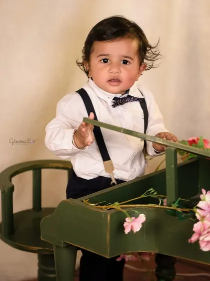 A gallery of our popular school and library theme. These images show the versatility of the brick wall backdrop, mini school desk, globe, and book props for creating a variety of scholarly and classic portraits.