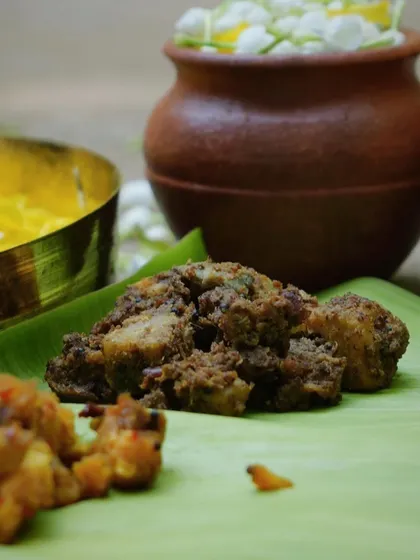 Kootu Curry is a prominent dish in any Sadya. My version features Kadala (black chickpeas) and yam cooked in a thick, warm coconut masala, creating a hearty and nutritious curry.