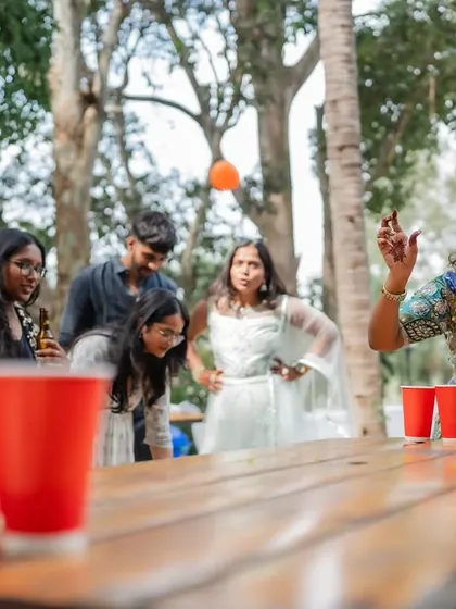 The energy of the baraat and pre-wedding festivities is infectious. We capture the couple and their friends dancing, playing games, and celebrating with pure, uninhibited joy.