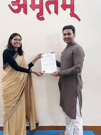 Awarding a 200-hour YTTC certificate to another successful graduate. Her journey is an inspiration to all of us at the foundation.