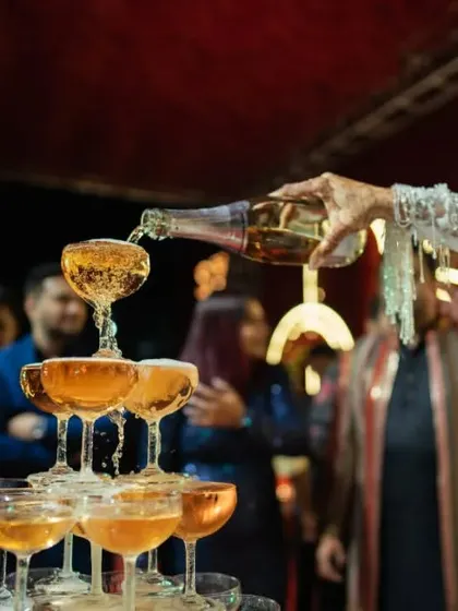 A close-up of the champagne being poured, a moment perfectly executed by our team.