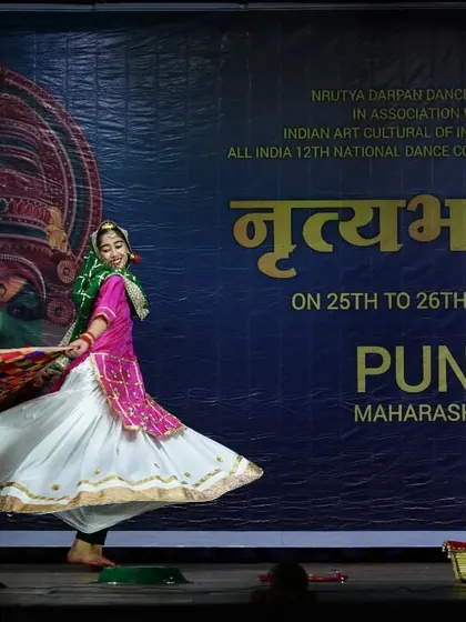 A series of photos from a Gidha performance at a national competition in Pune, showcasing the colorful costumes and lively spirit of this Punjabi folk dance.