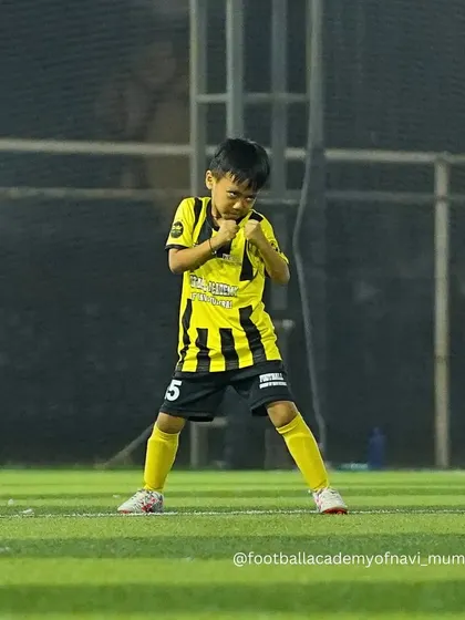 This young player is ready for action. I focus on building confidence and a fighting spirit in even my smallest athletes.