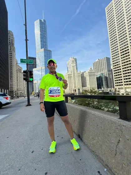 My client standing proud in the streets of Chicago after his marathon. Seeing athletes I coach achieve their dreams, especially on a world stage, is the most rewarding part of my job.