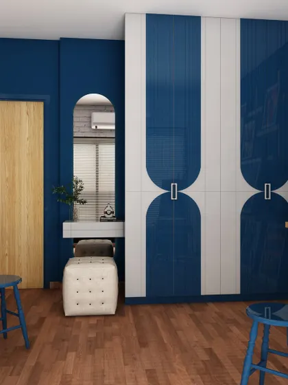 This view of the art studio concept highlights the custom wardrobe with a unique blue and white geometric pattern. It demonstrates our ability to integrate smart, stylish storage solutions into any creative space.