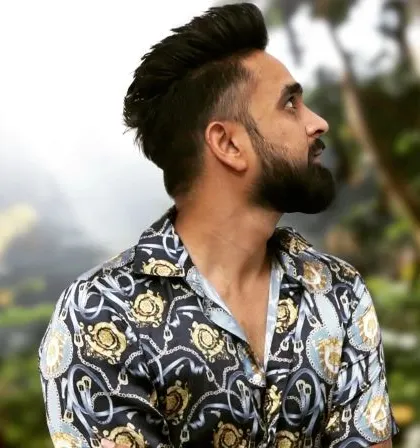 Another look in a stylish printed shirt. I like to bring a unique fashion sense to my gigs.