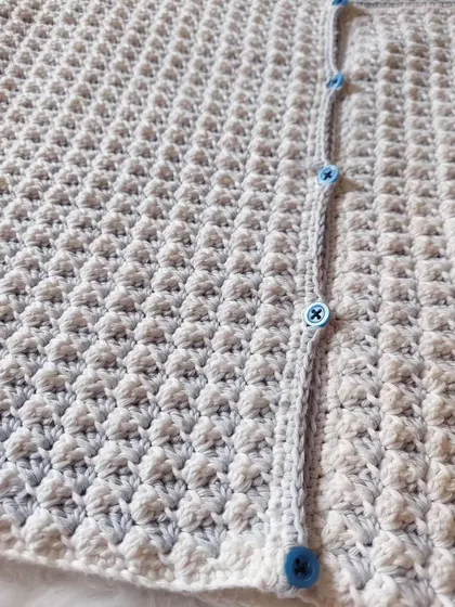 Another detailed shot of the intricate stitchwork that gives this CoCo Jacket its unique texture.