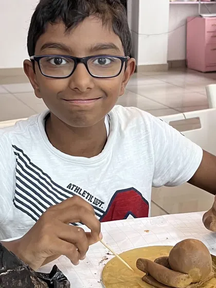 Focus and dedication from one of our young sculptors. It's amazing to watch participants of all ages get deeply involved in the art-making process.