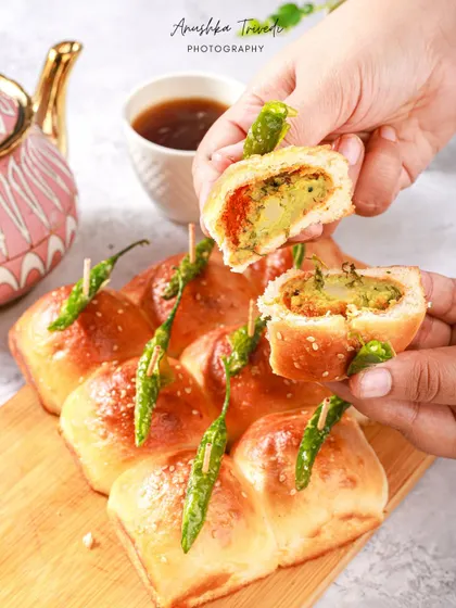 A shot showing the inside of the stuffed pav, revealing the delicious potato filling.