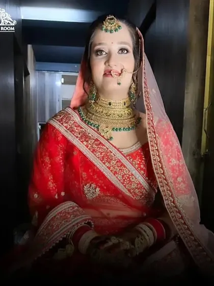 A full-length shot showing how the makeup and styling come together to create a stunning silhouette for the bride.