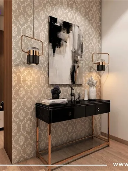 A stylish console table with modern lamps and abstract art creates an elegant and welcoming foyer.