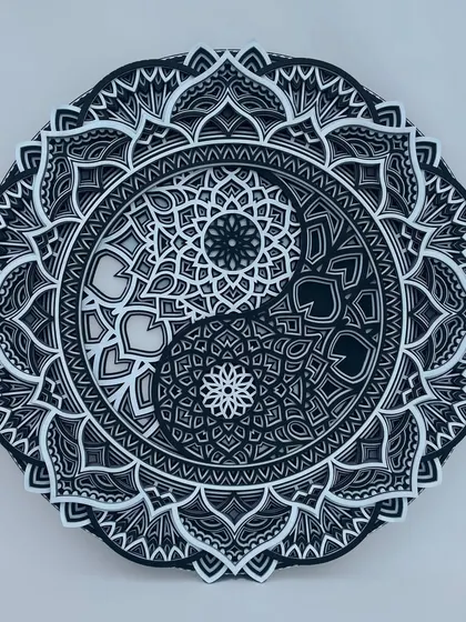 Find balance and serenity with our handmade wooden Yin Yang mandala. This spiritual wall decor features multiple layers of intricate patterns, creating a beautiful play of shadow and light that adds a peaceful, harmonious touch to your home.