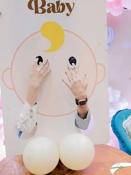 A 'Pin the Eyes on the Baby' game, a fun twist on a classic.