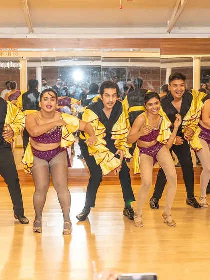 Another shot of our student team's vibrant performance. We focus on creating choreographies that are not only technically challenging but also fun to perform.