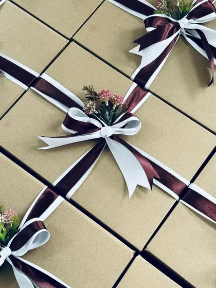 Another angle of the neatly arranged corporate gift boxes, perfect for employee appreciation or client gifts.
